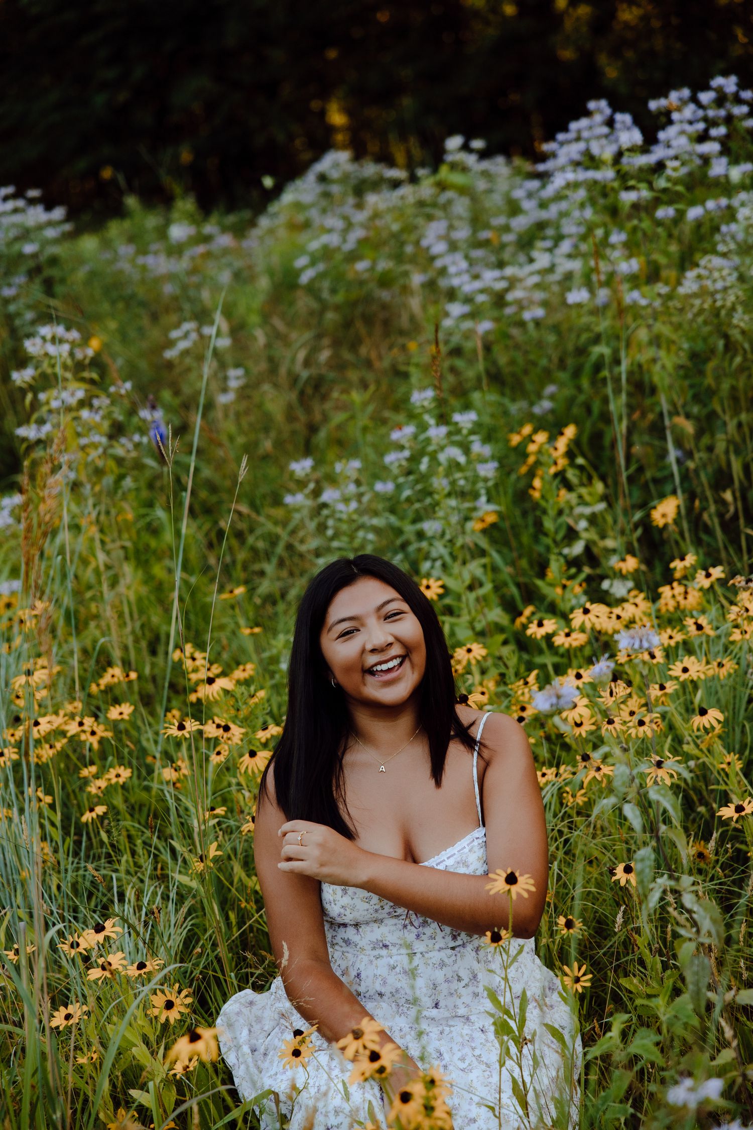 A joyful moment captured among blooming wildflowers in natural evening light.