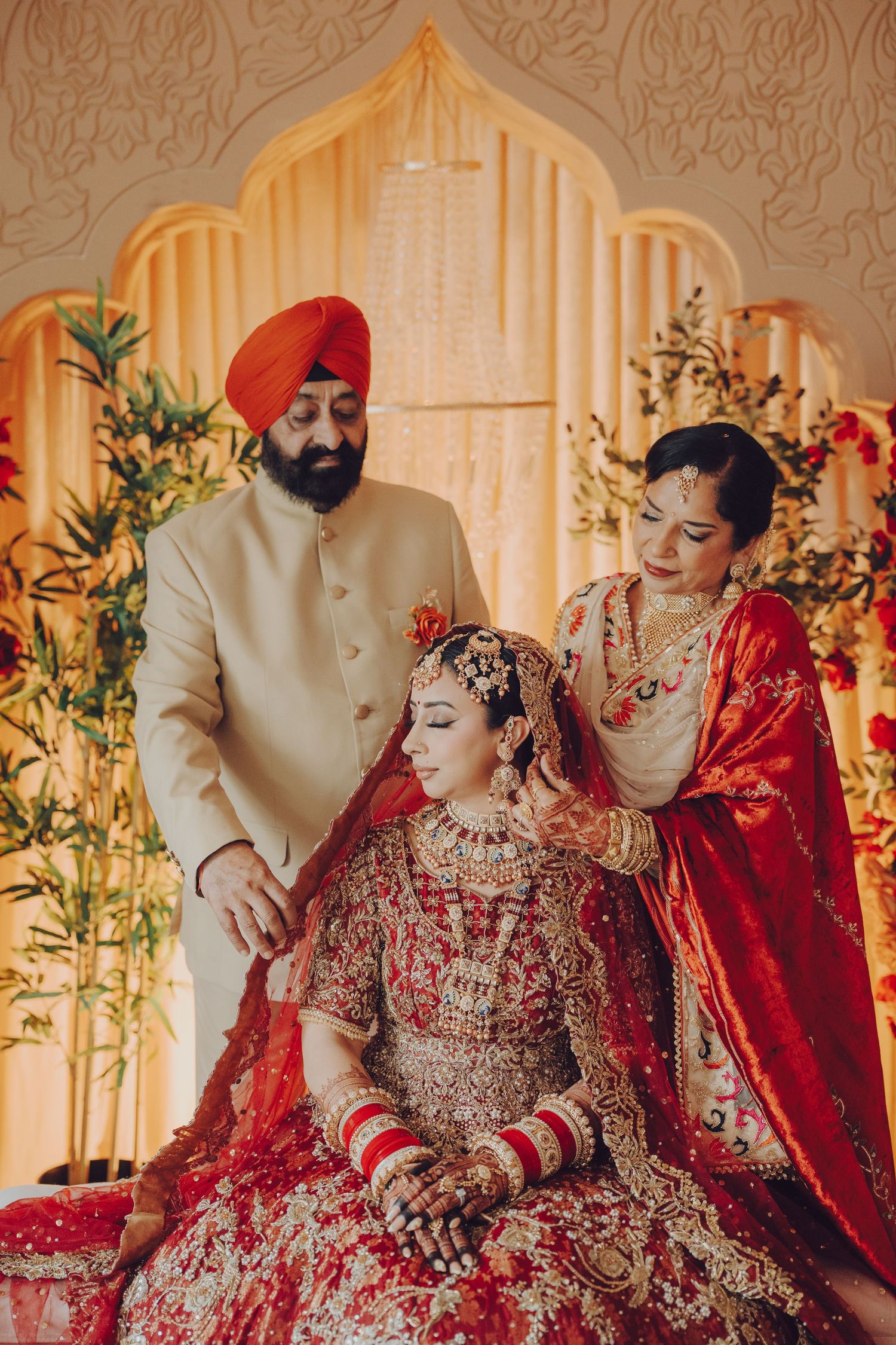 Traditional Sikh wedding ceremony with ornate decor and cultural attire.