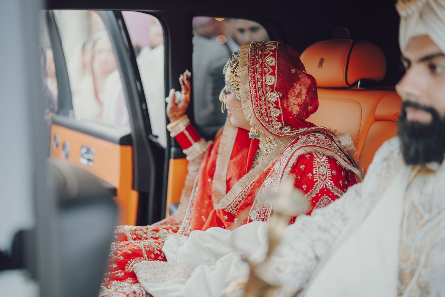 Close-up details of traditional Indian wedding ceremony with decorative bridal accessories.