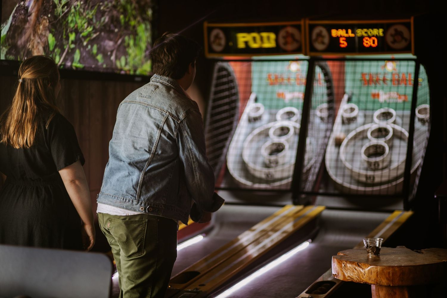 Newly engaged couple paying an arcade game, Richmond photographer, rachel gorth, armory photography