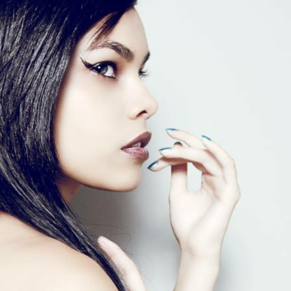 Artistic black and white beauty portraits showcasing dramatic eye makeup and lips.