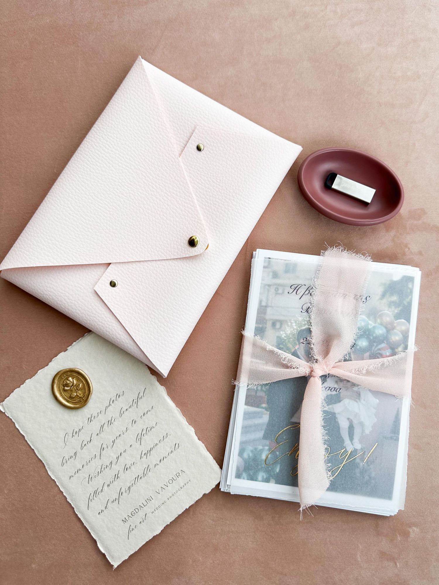 A series of vintage polaroid photos being carefully wrapped in delicate white paper envelopes with handwritten notes.