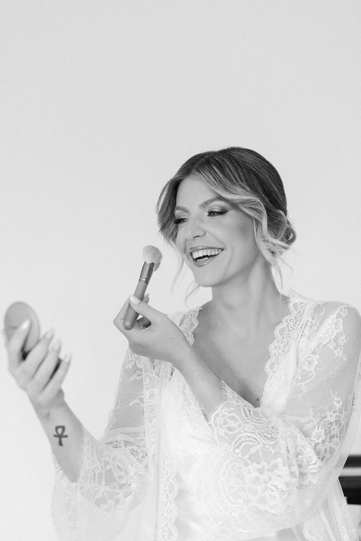 Black and white portrait series showing joyful expressions and laughter.