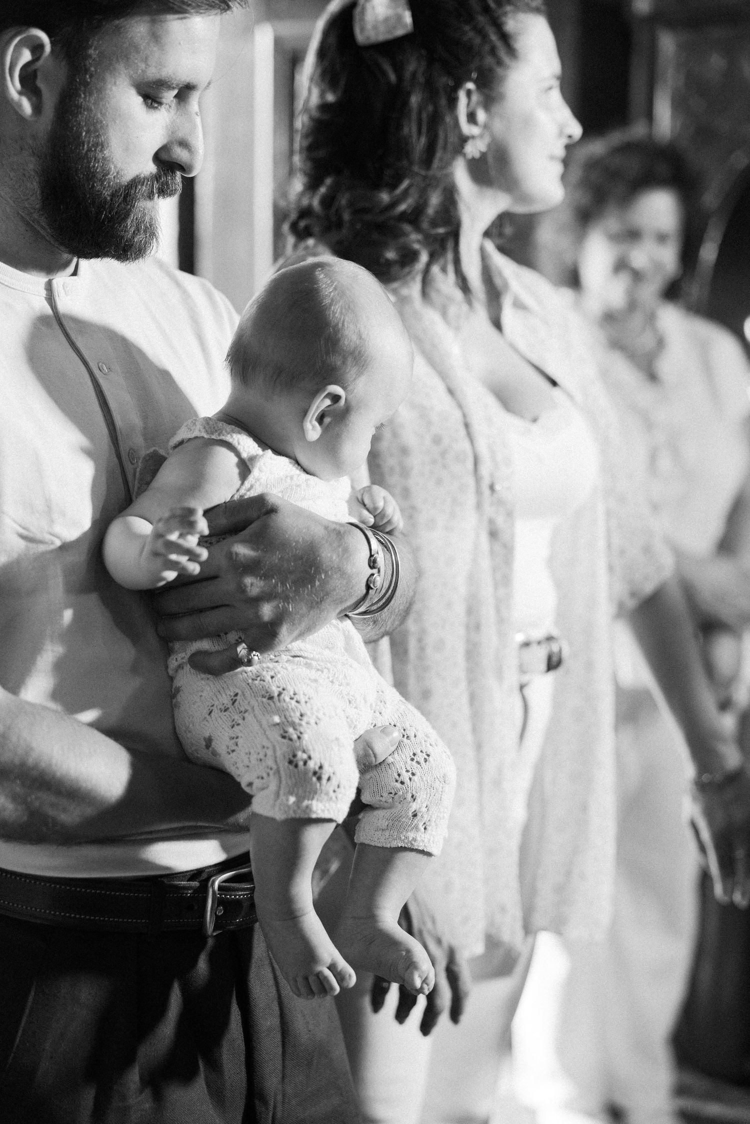 Black and white candid moment at a special gathering.