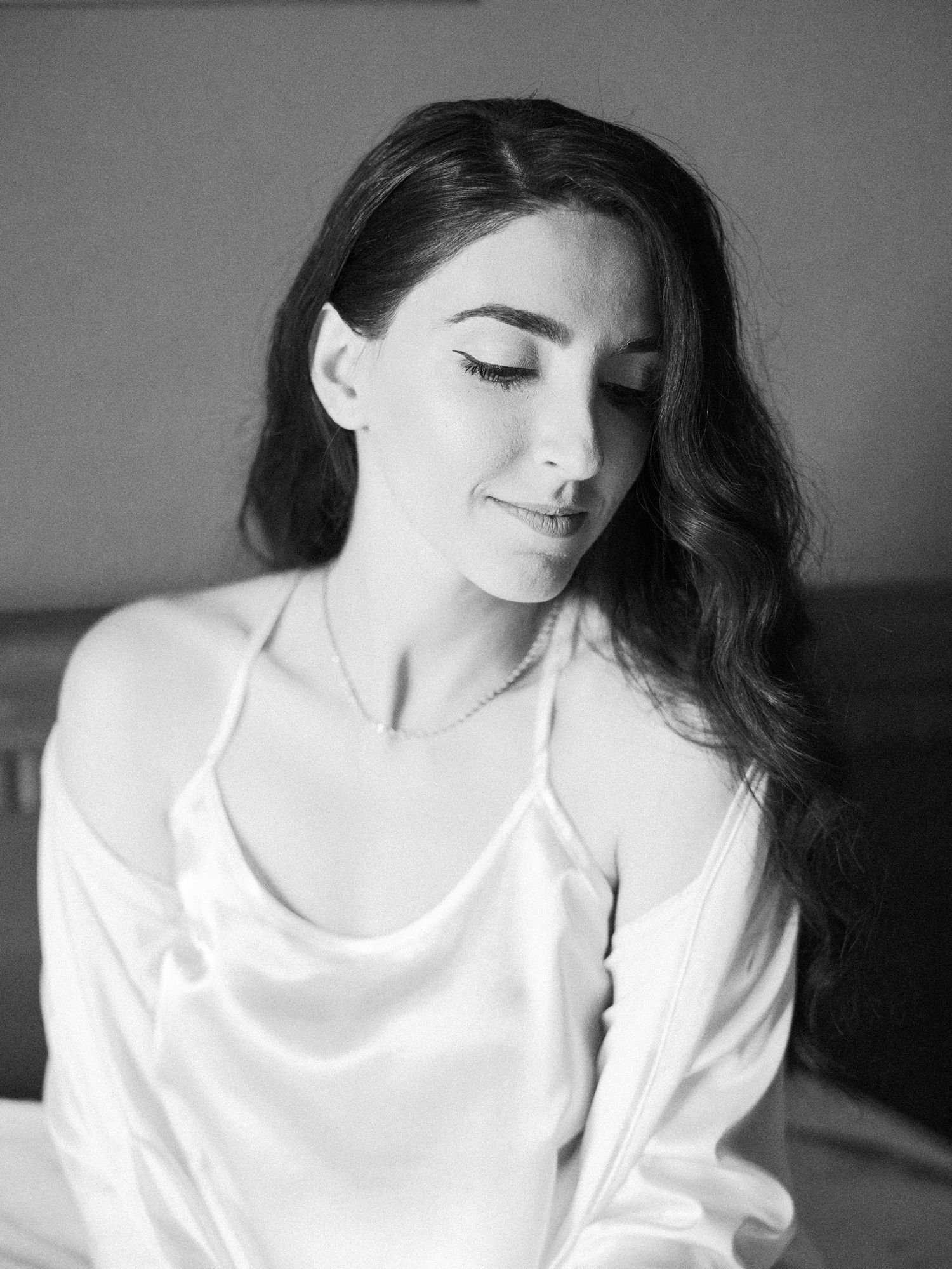 Dreamy black and white portrait series showing soft, intimate moments.