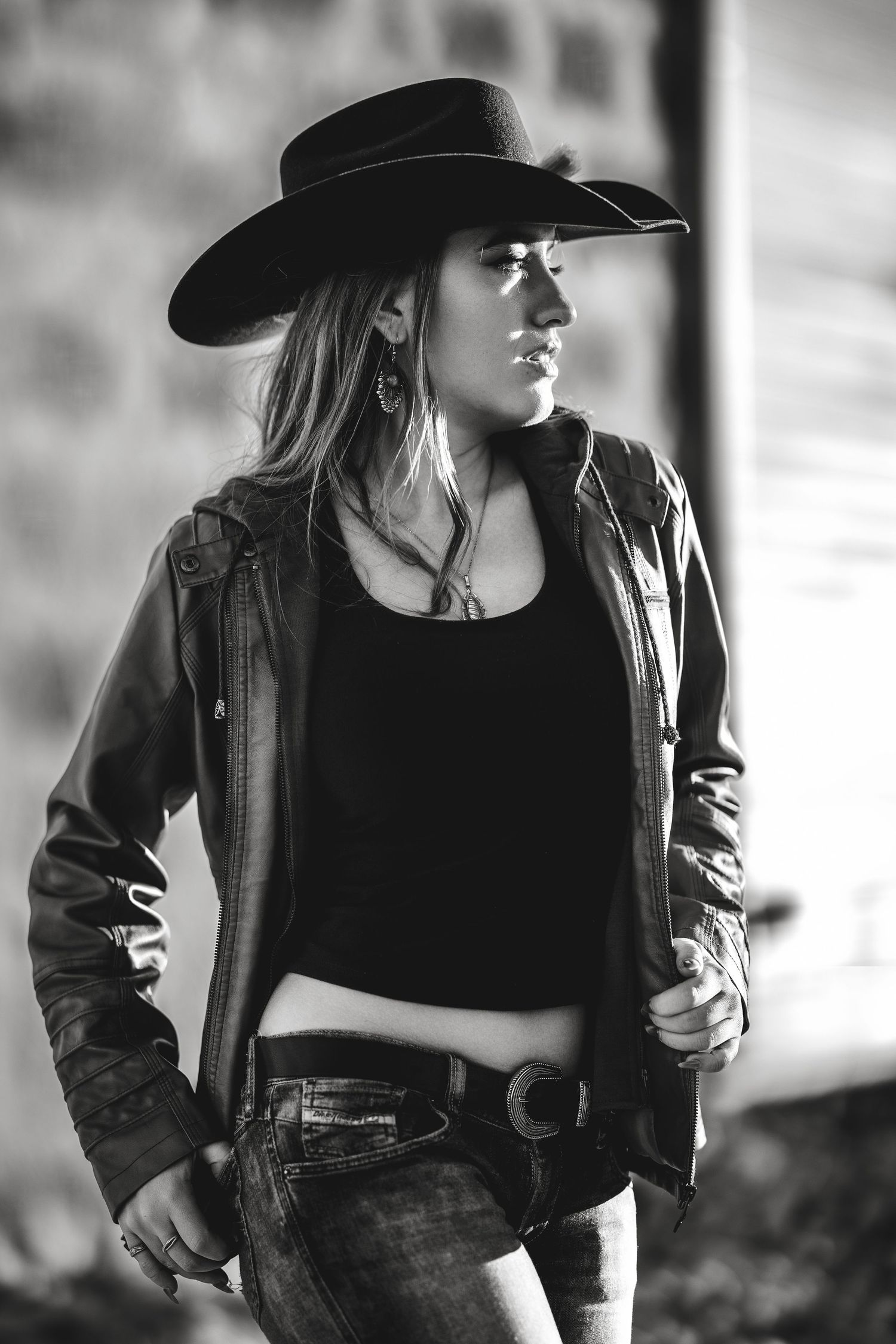 Black and white portrait series showing a person in western attire with a cowboy hat against a blurred background.