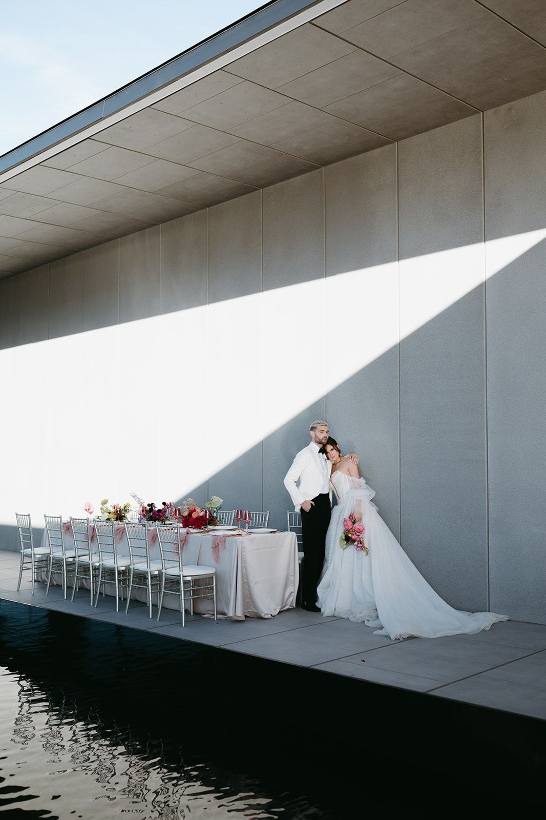 Editorial and luxury floral tables cape and bride and groom portraits at the Hall of Lights venue.