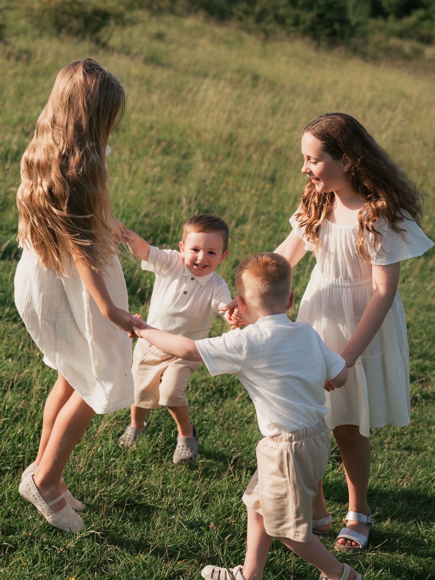 Children playing ring a roses, documentary photo