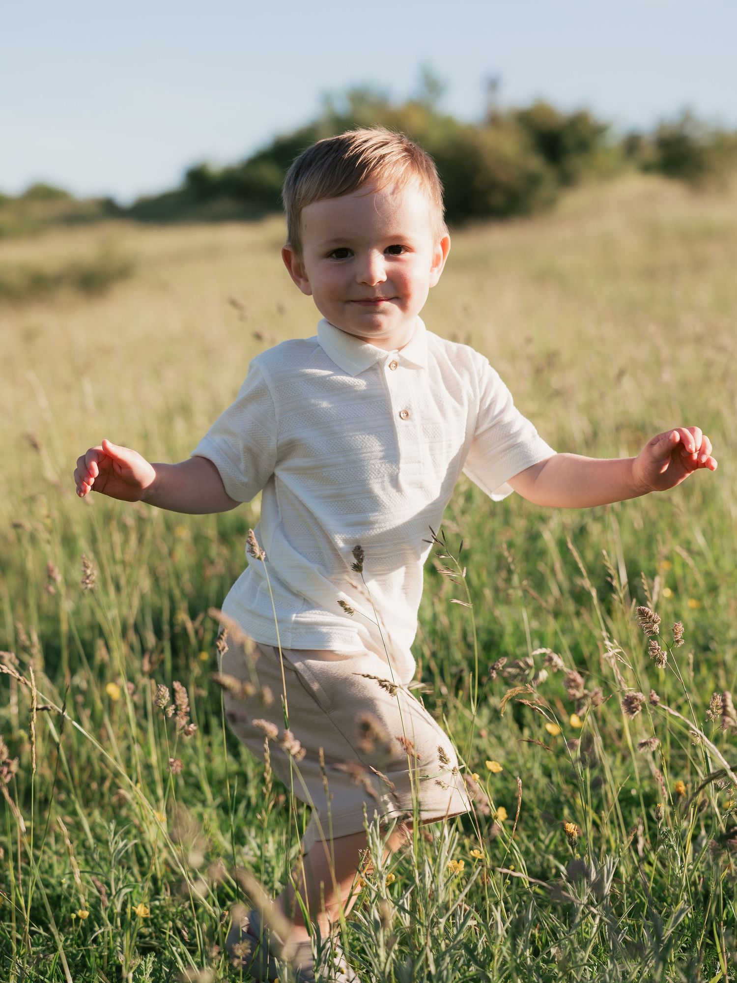 Little boy playing in the field