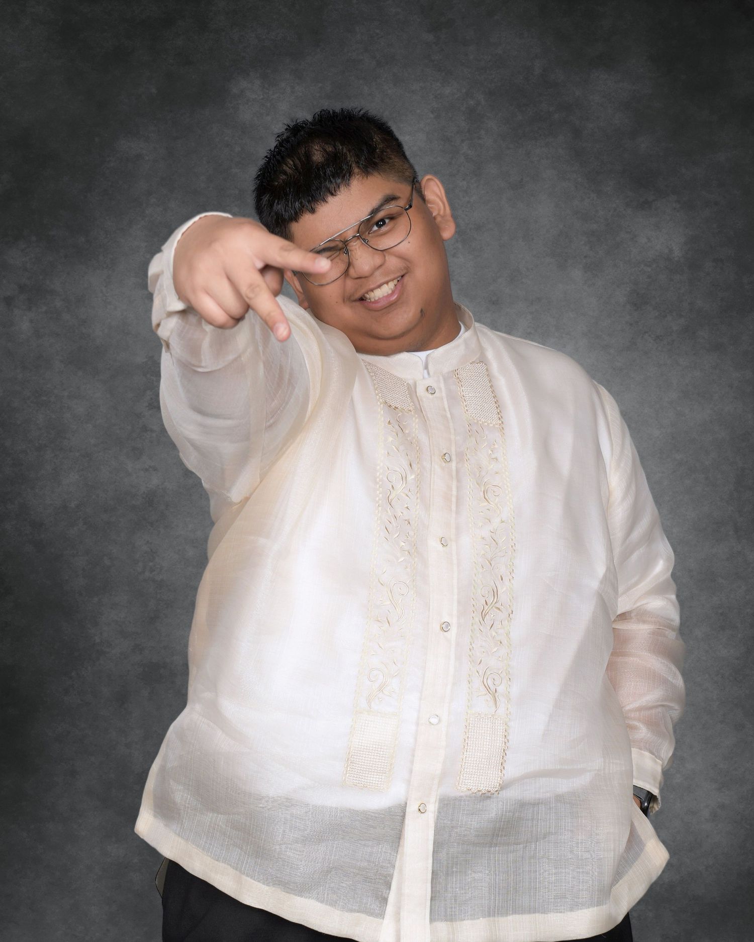 Studio portrait sequence showing playful poses in traditional white barong tagalog attire.