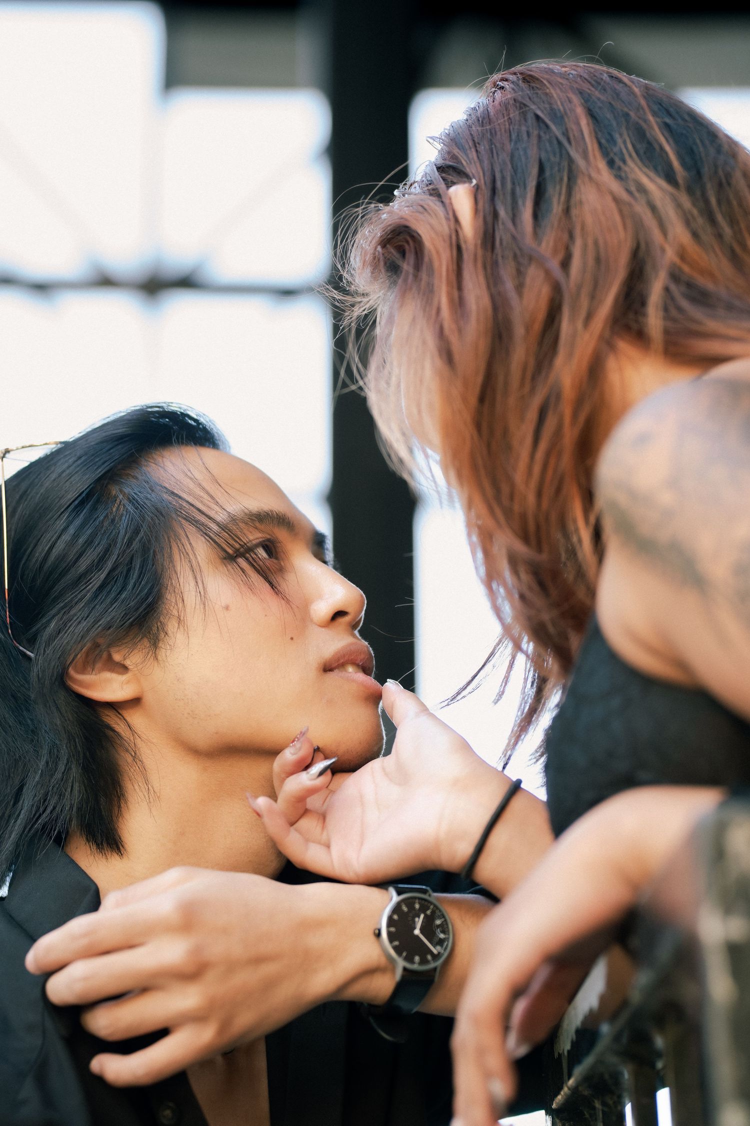 Artistic portrait sequence showing intimate close-up shots with dramatic lighting and shadows.