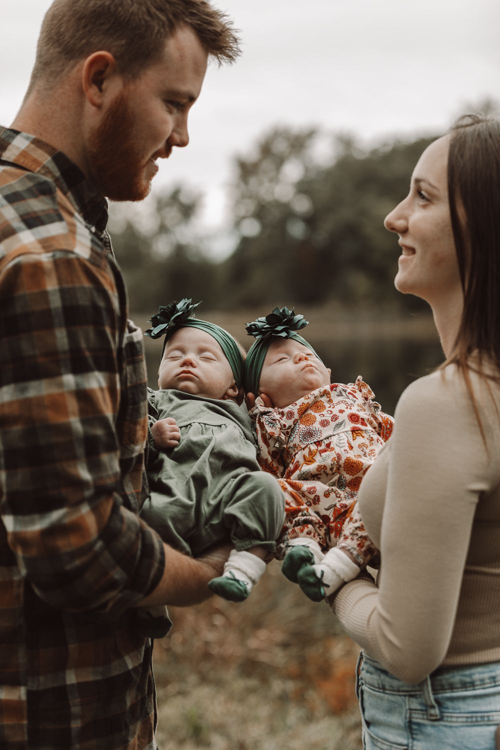 Family sharing tender moment together on autumn day.