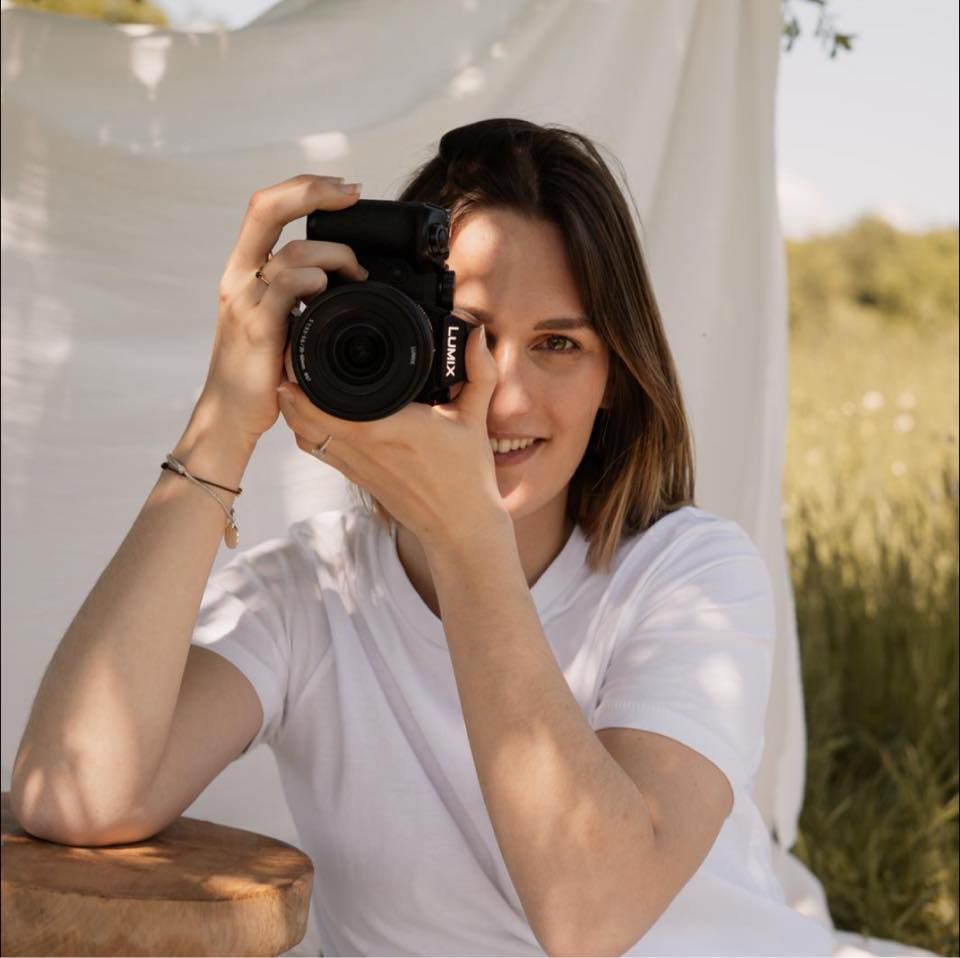 La photographe qui prend une photo