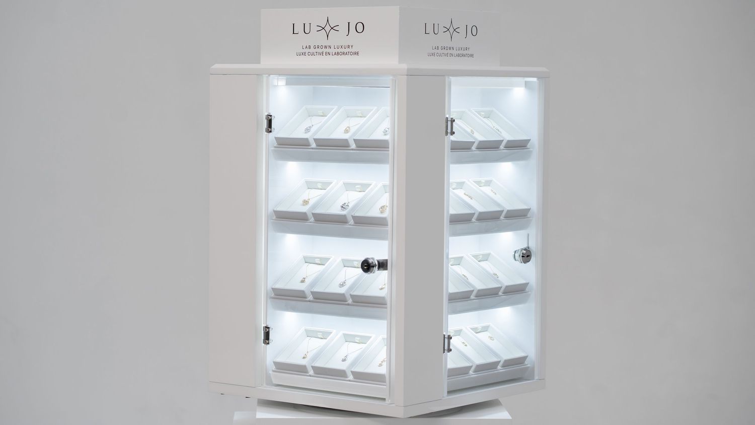 A series of white window frames with natural light streaming through, creating a minimalist architectural composition.