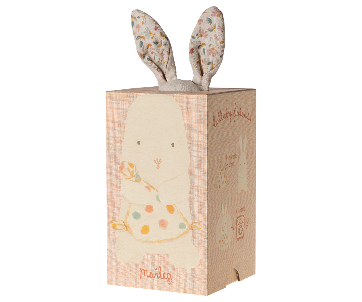 A series of pink and beige tissue box designs with bunny ears and whimsical decorative elements arranged in a row.