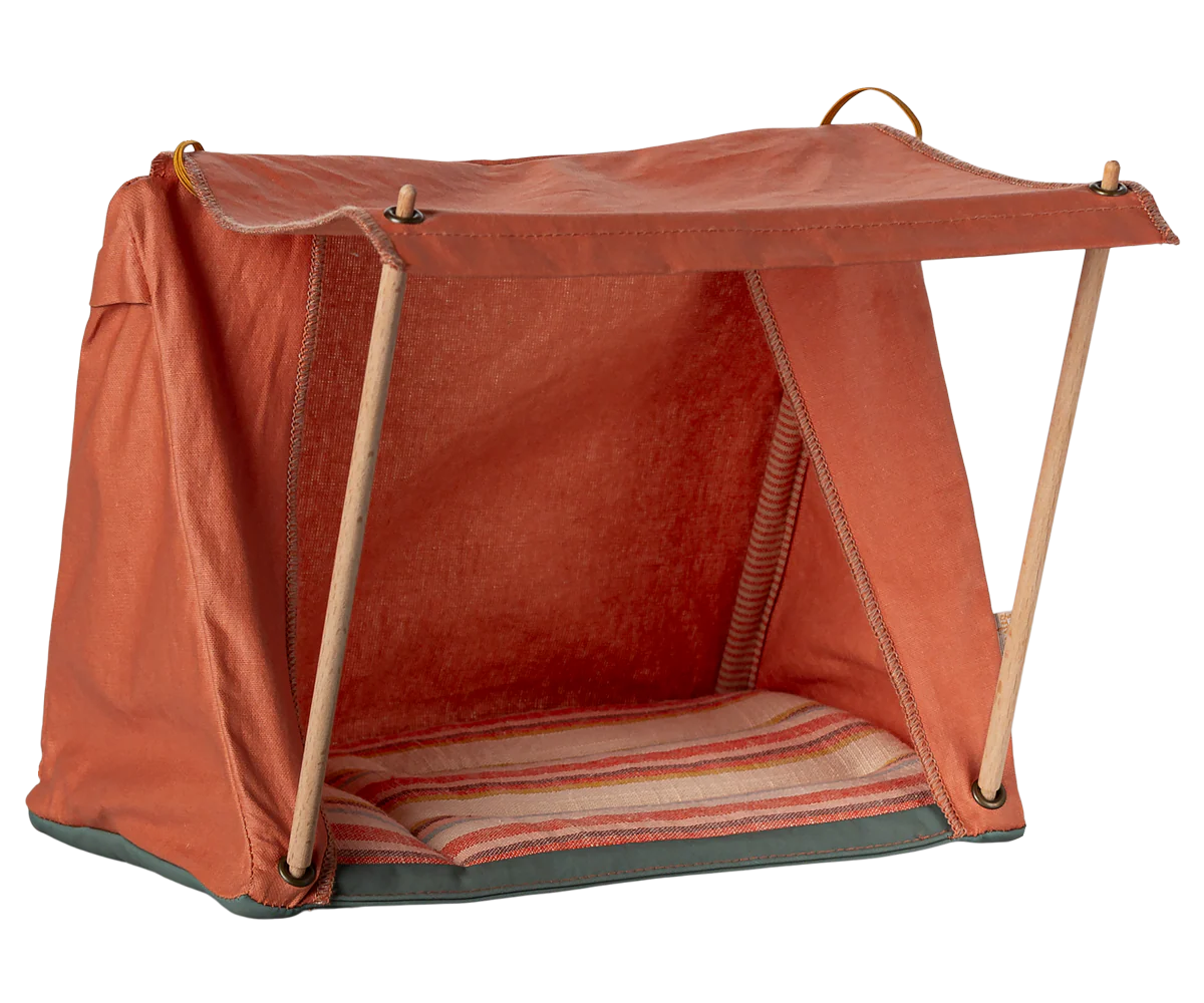 A series of red folding cots shown in different stages of assembly and folding positions.
