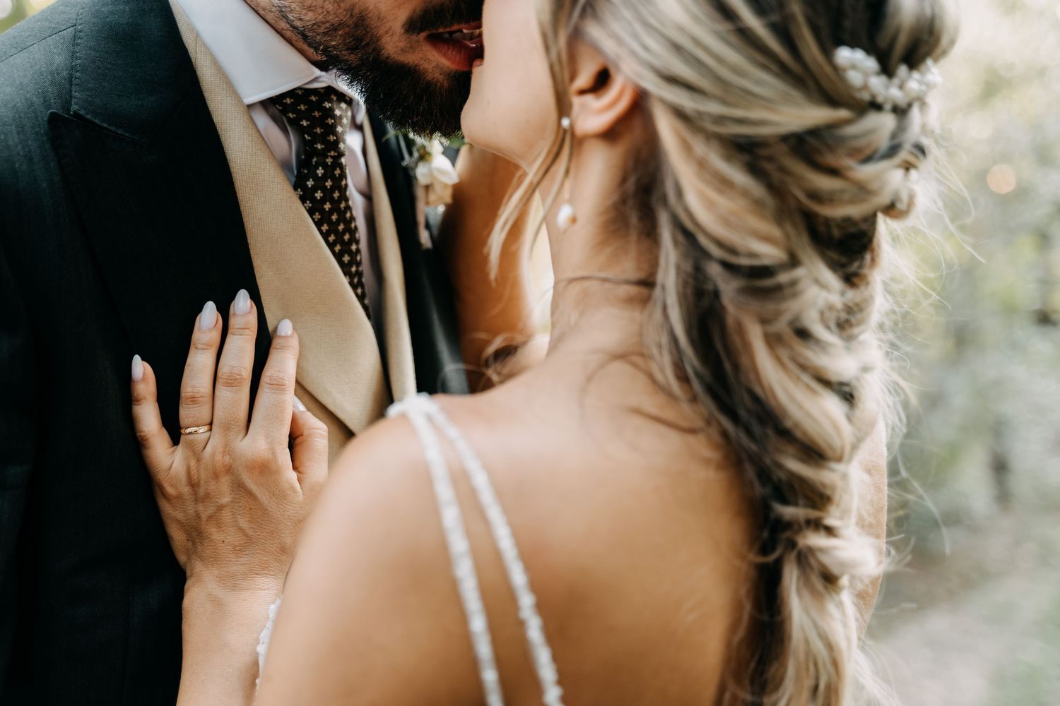 Artistic black and white wedding photography series showing intimate romantic moments between a bride and groom.