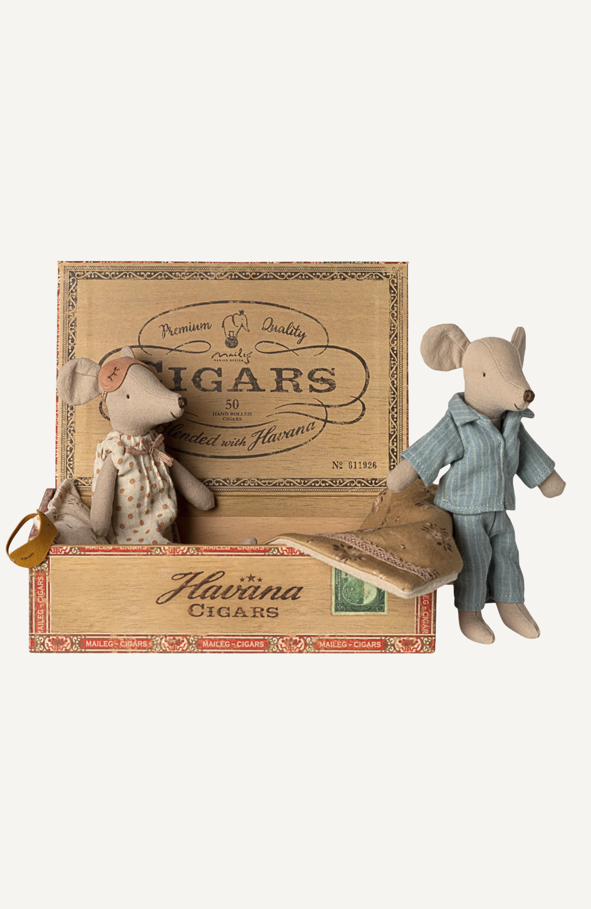 Two mouse dolls in a vintage Havana Cigars wooden box, dressed in pajamas with a cozy blanket.