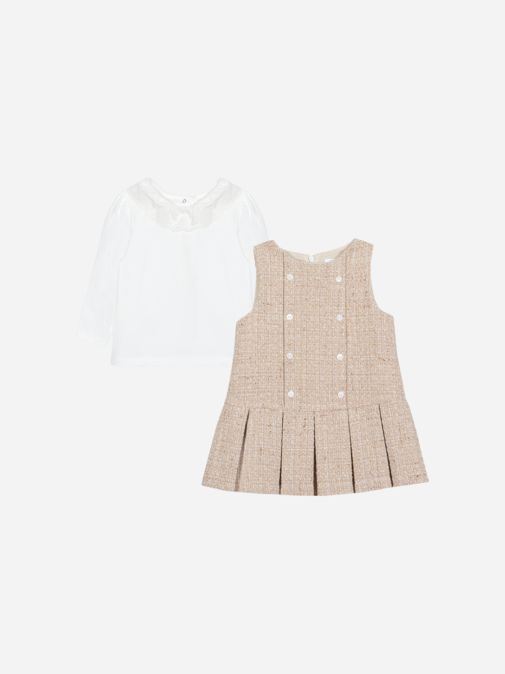 Two-piece white and beige children's outfit with pleated dress and button detail on sleeveless jumper.