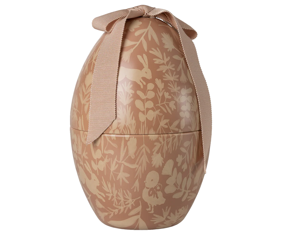 Beige ceramic vase with floral pattern shown from multiple angles against white background.