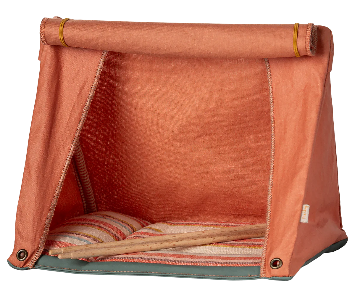 A rustic brown leather bag shown from multiple angles displays its vintage-style design and spacious compartments.