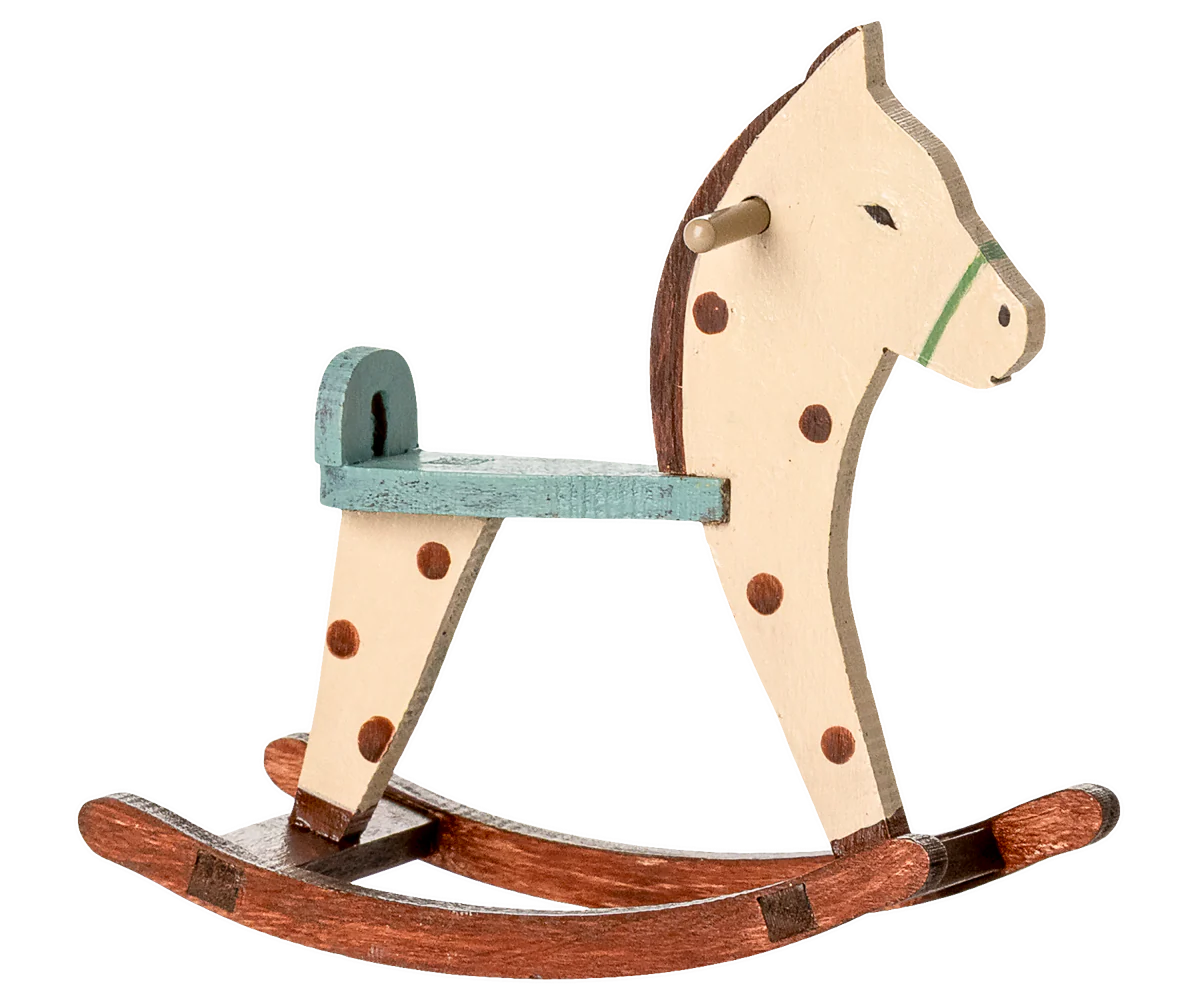 Vintage wooden rocking horse toys shown in various positions against a white background.