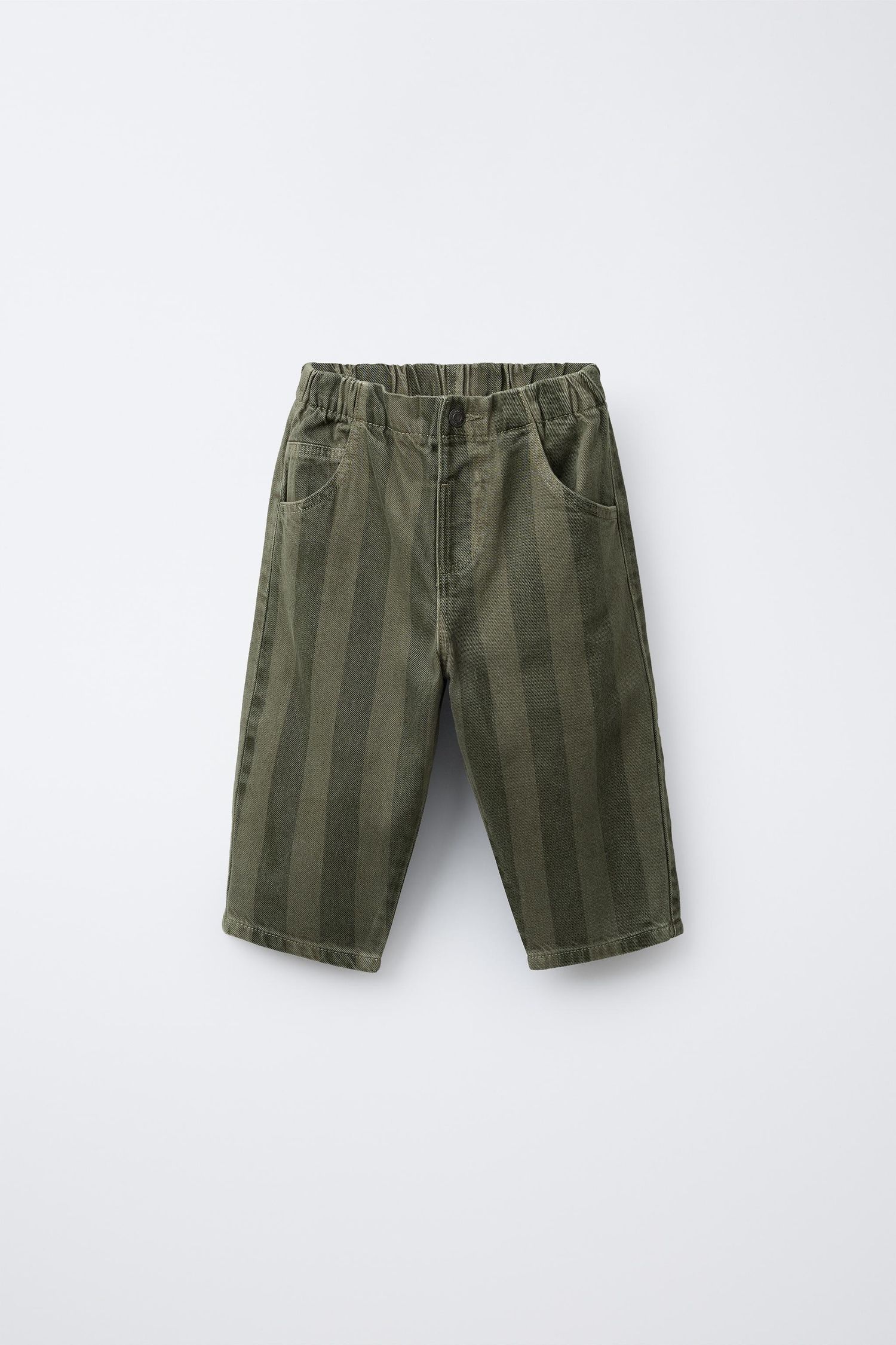 Olive green striped denim shorts and pants laid flat on white background showing casual summer style.