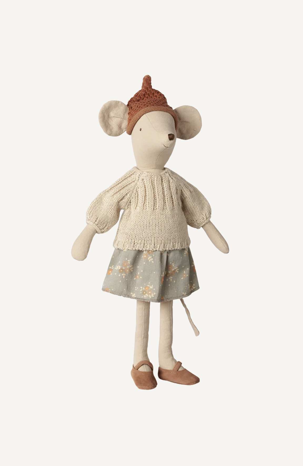 Maileg mouse doll in cream knit sweater, floral skirt, brown hat and shoes, standing upright on white background.
