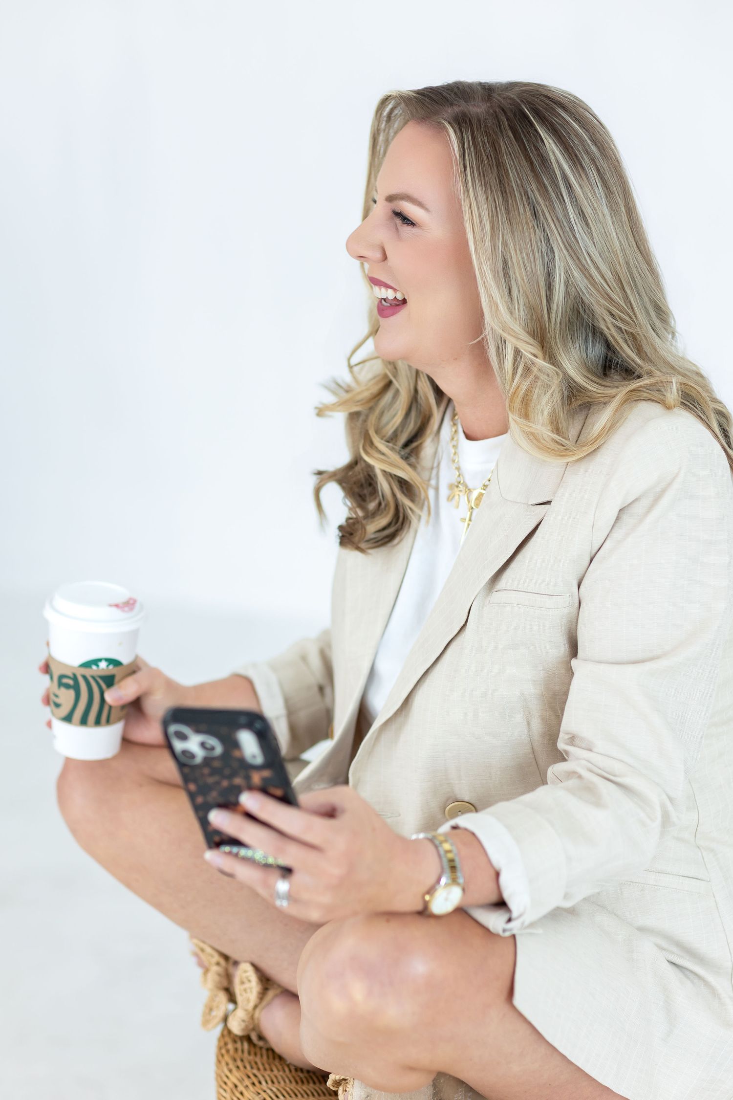 Lifestyle branding portrait of Houston senior and family photographer Carla Collins working behind the scenes.