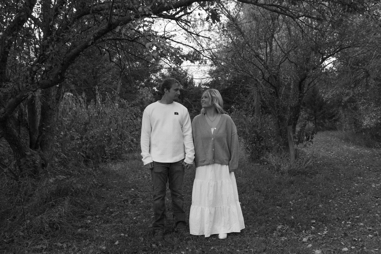 Couple holding hand and looking at eachother