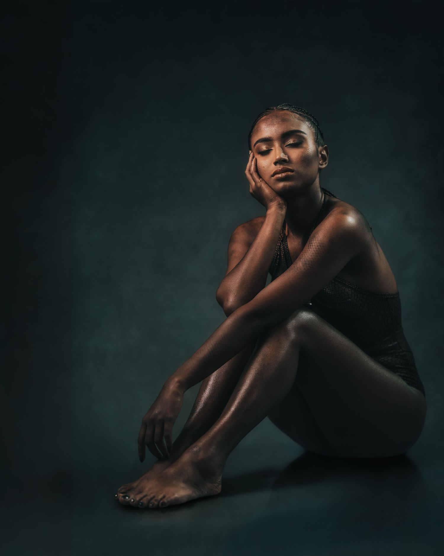 Artistic portrait series showing graceful body poses against a dark background.