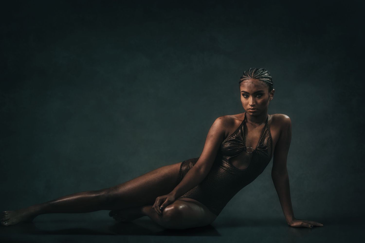 Artistic full body portraits in dark setting showing graceful poses.