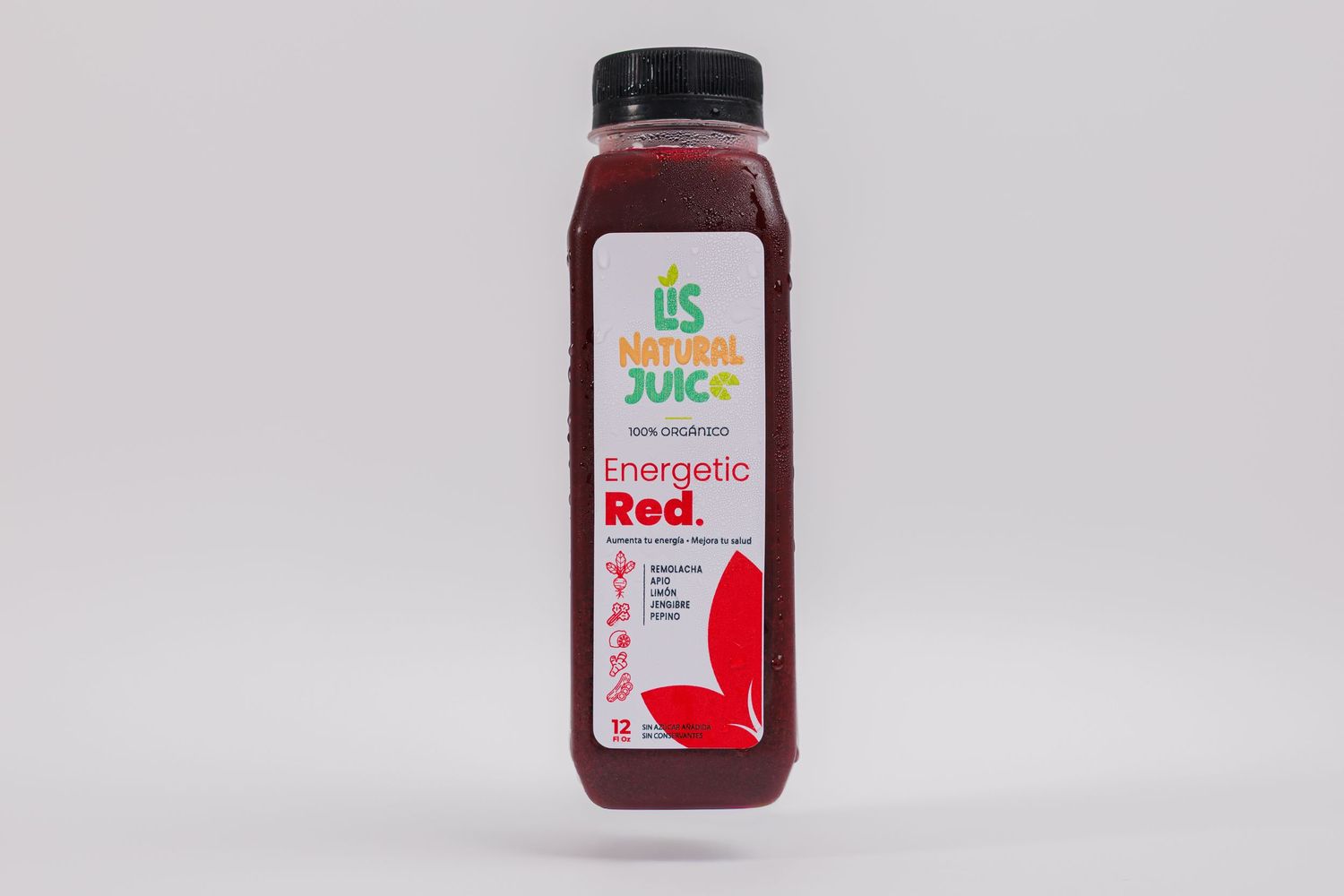 A bottle of IIS Natural Juice Energetic Red cold-pressed juice on a white background.