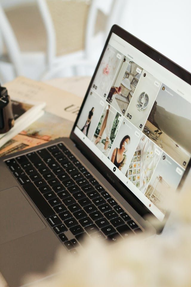 Multiple views of a MacBook laptop keyboard and screen shown at different angles on a light surface.