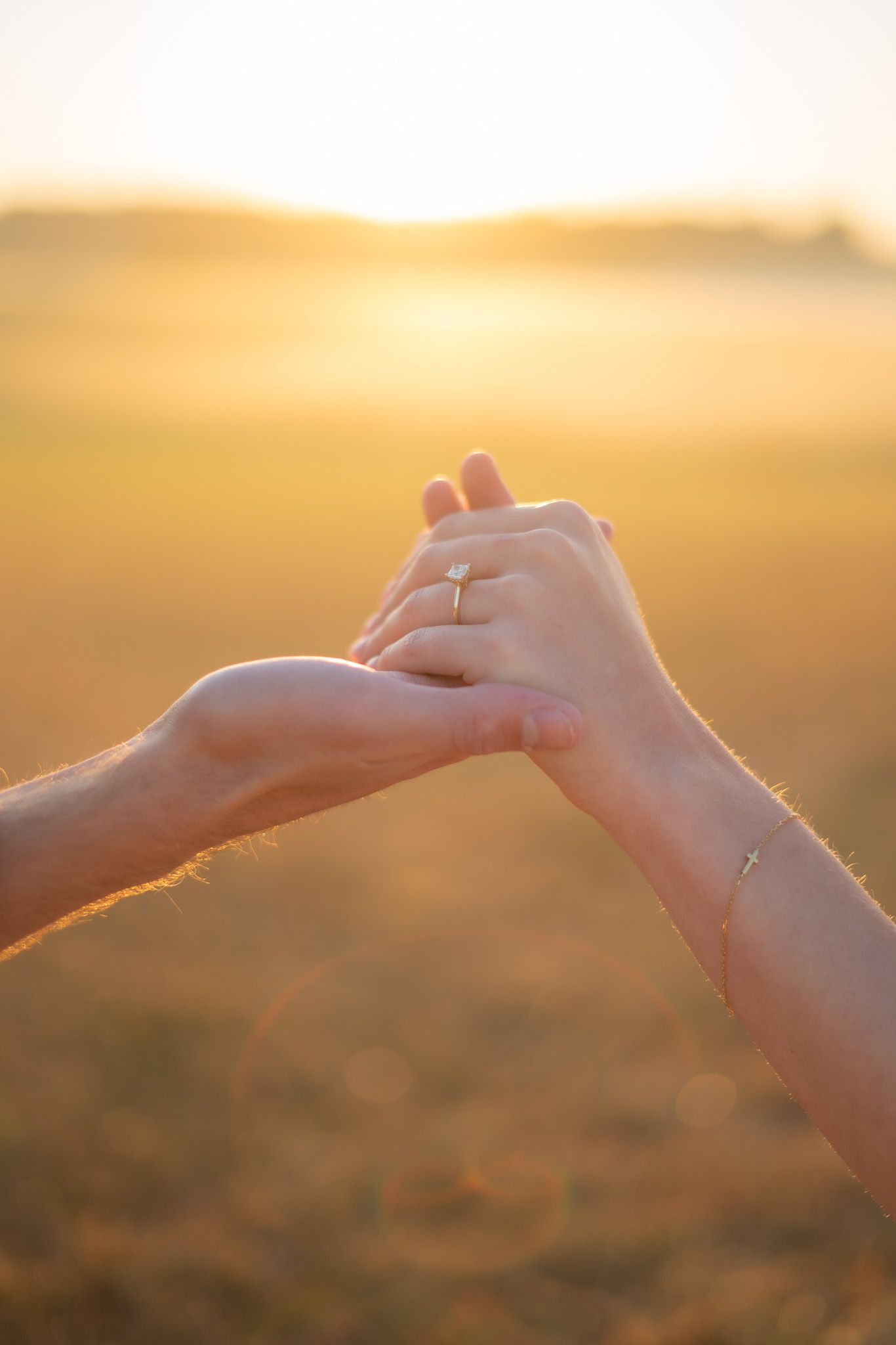 engagement photographer sun beaming in