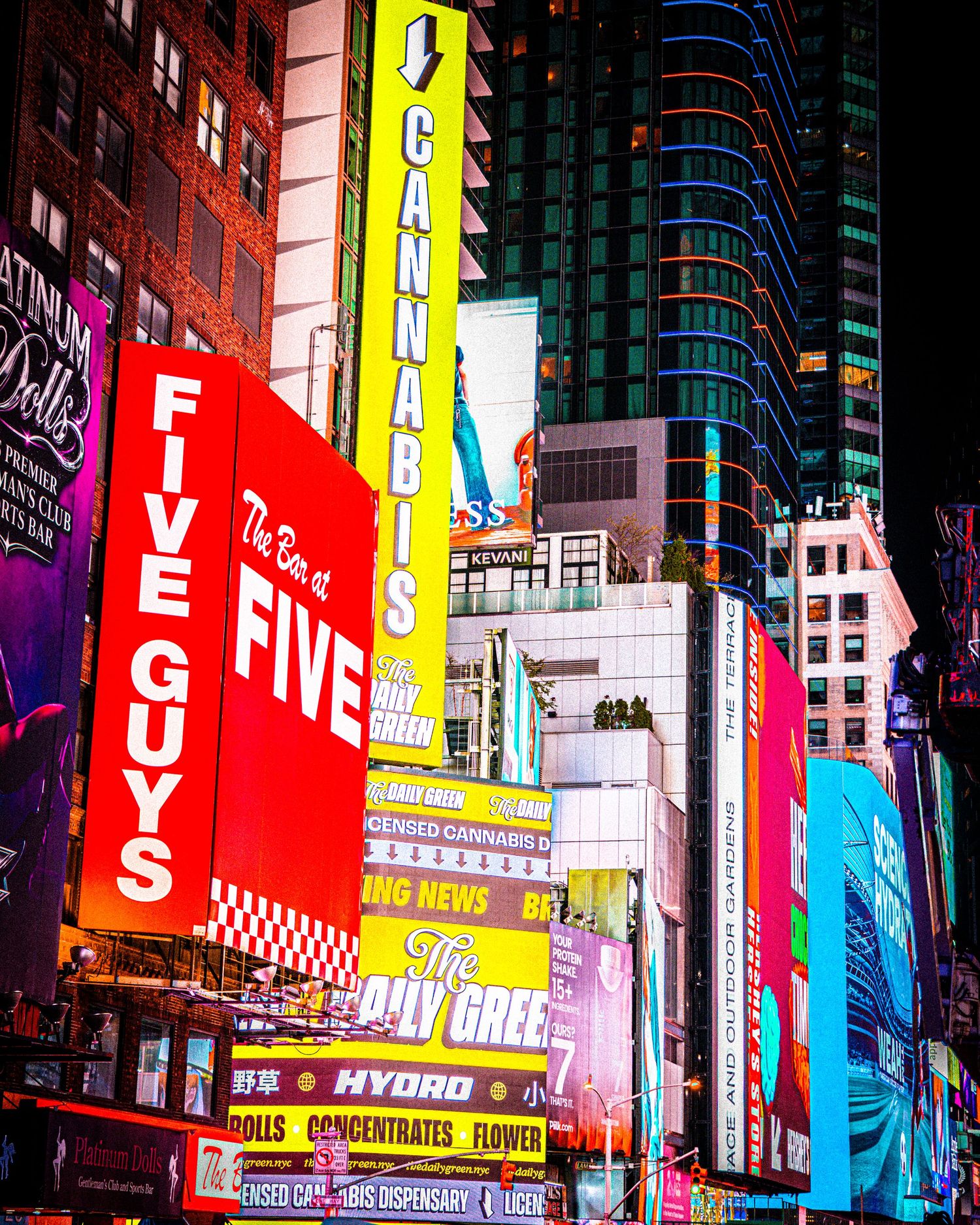 Colorful Times Square billboards advertising Five Guys, Cannabis dispensary, and The Daily Green in New York City.