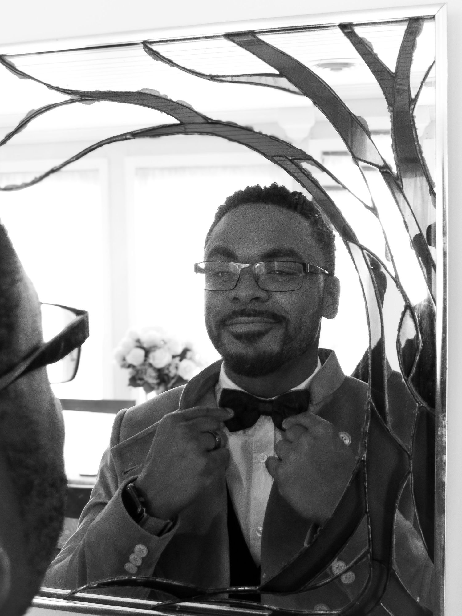 A sequence of black and white photos showing joyful expressions and smiles in formal attire.