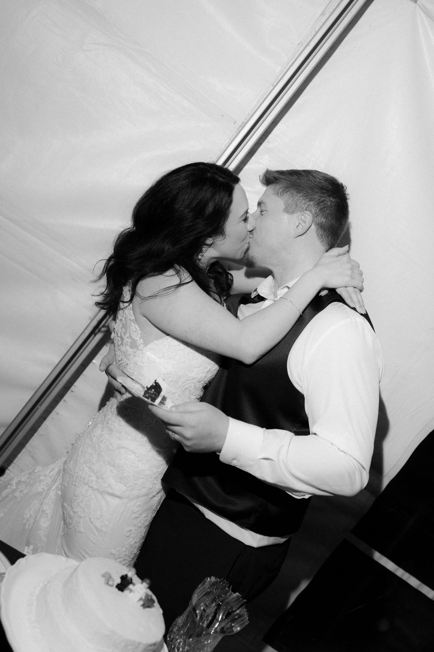 A romantic sequence of wedding photos showing a couple sharing intimate kisses and embraces during their special day.