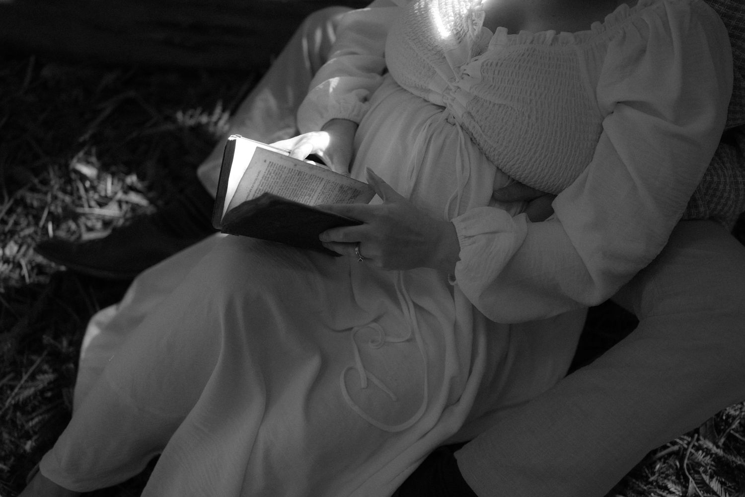 Black and white wedding photos showing intimate moments between couples during their special celebration.