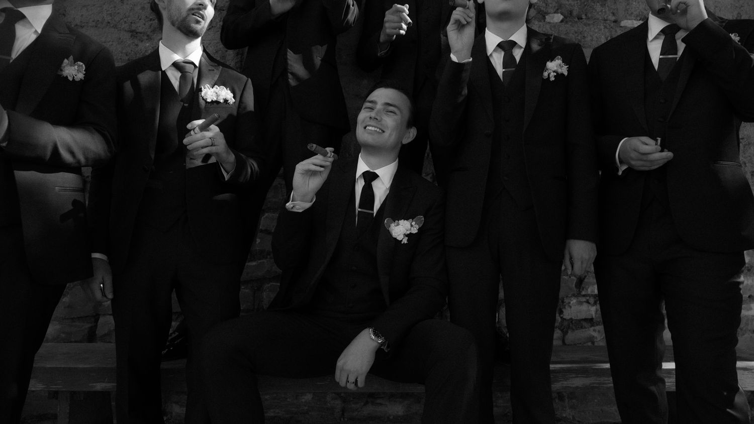 A black and white photo shows a large crowd of people gathered at a formal event or ceremony.