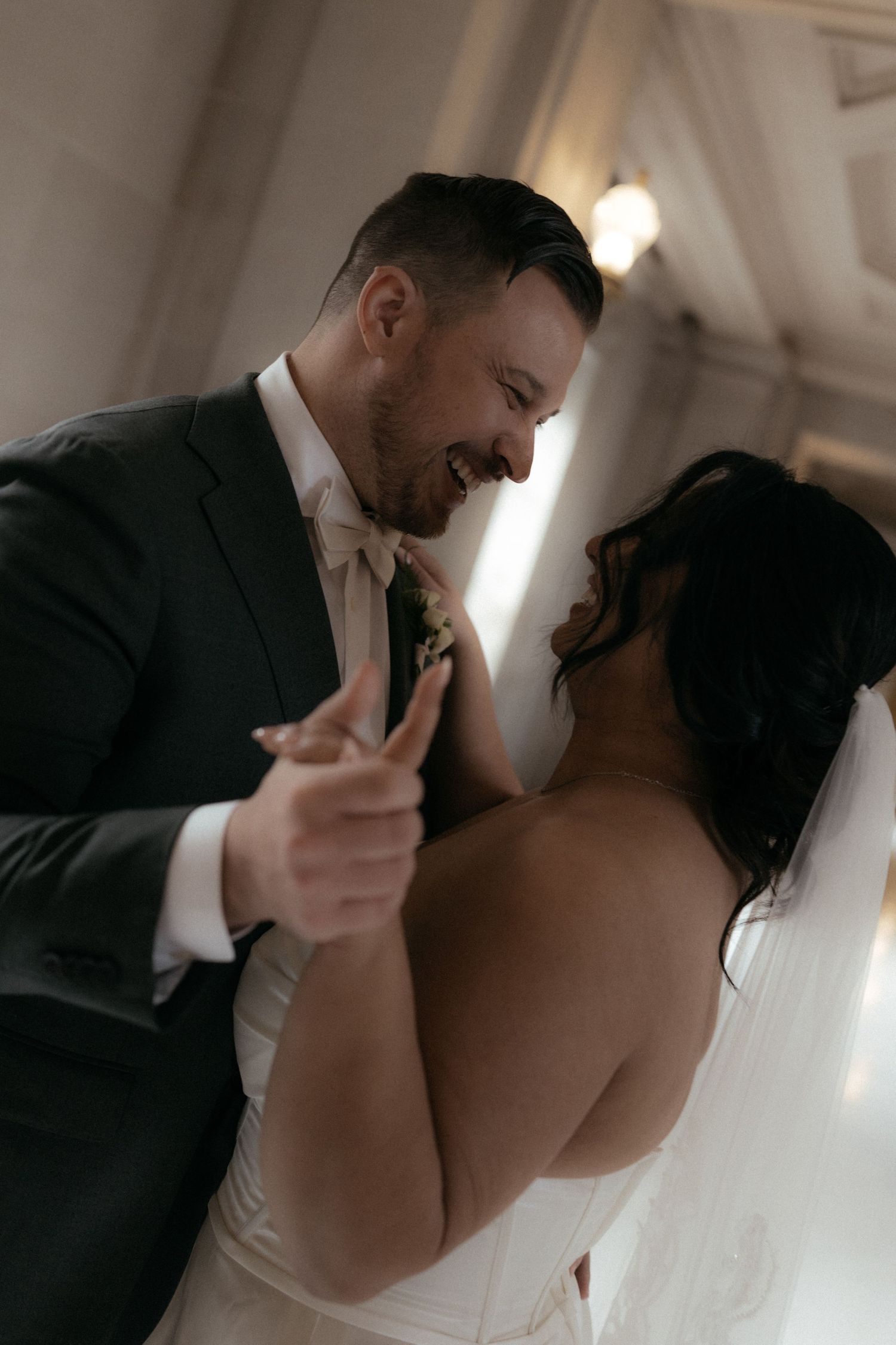 A romantic sequence of wedding photos showing a couple in formal attire sharing intimate moments together.