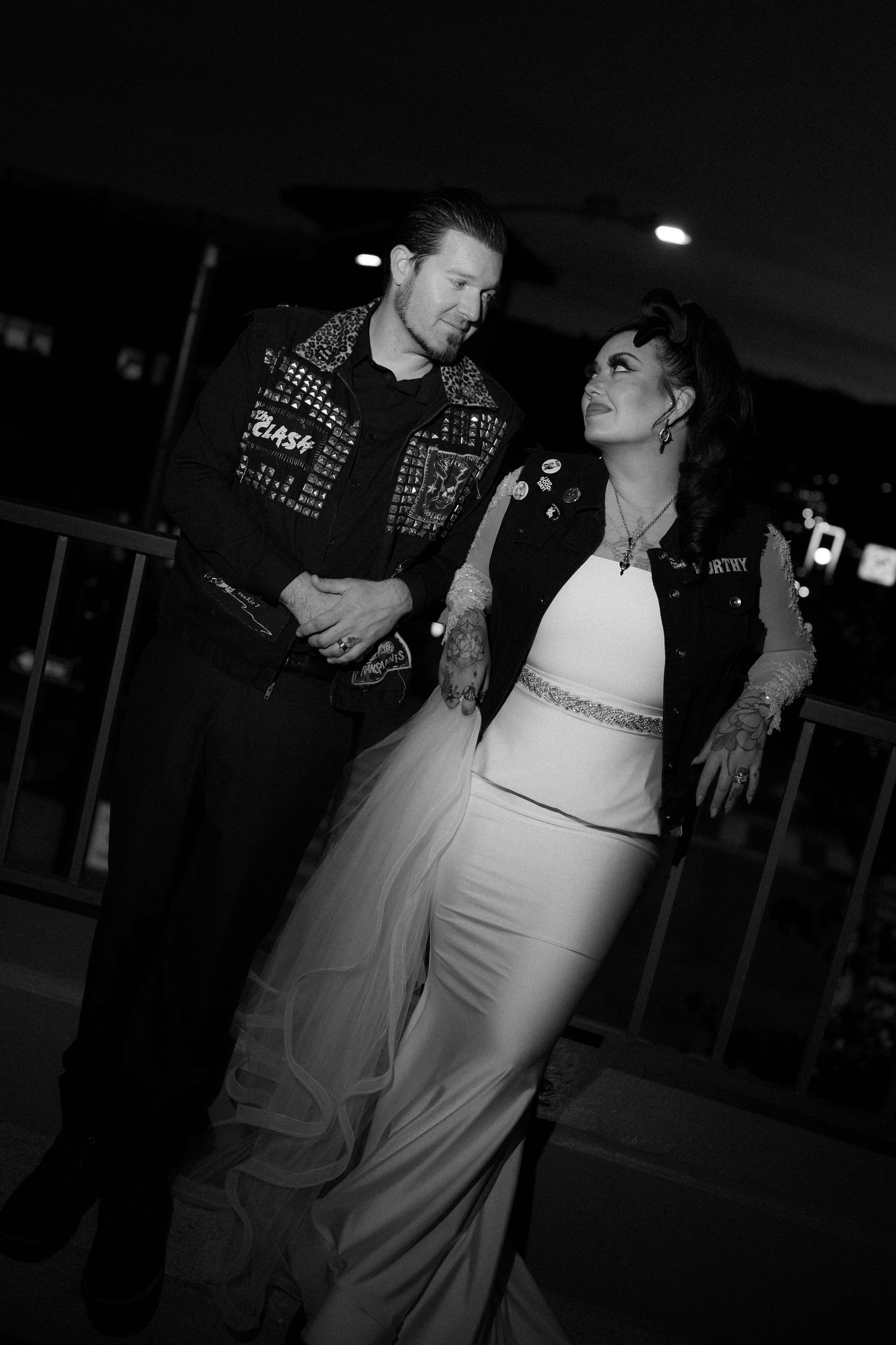 Black and white sequence showing a couple dancing in an intimate setting.