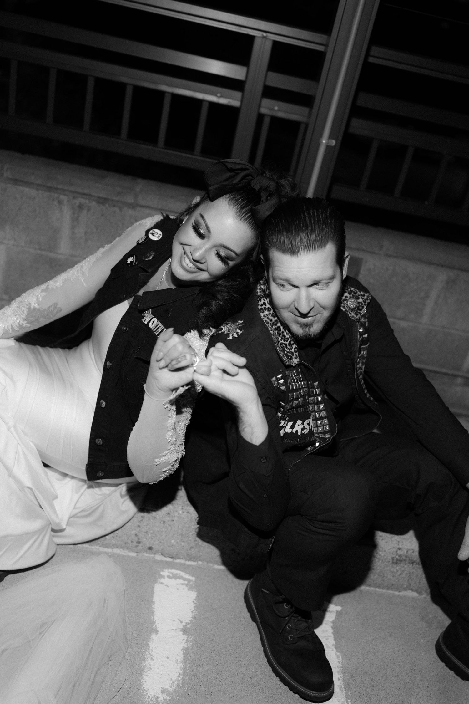 Black and white photo sequence of couple lying down in casual poses.