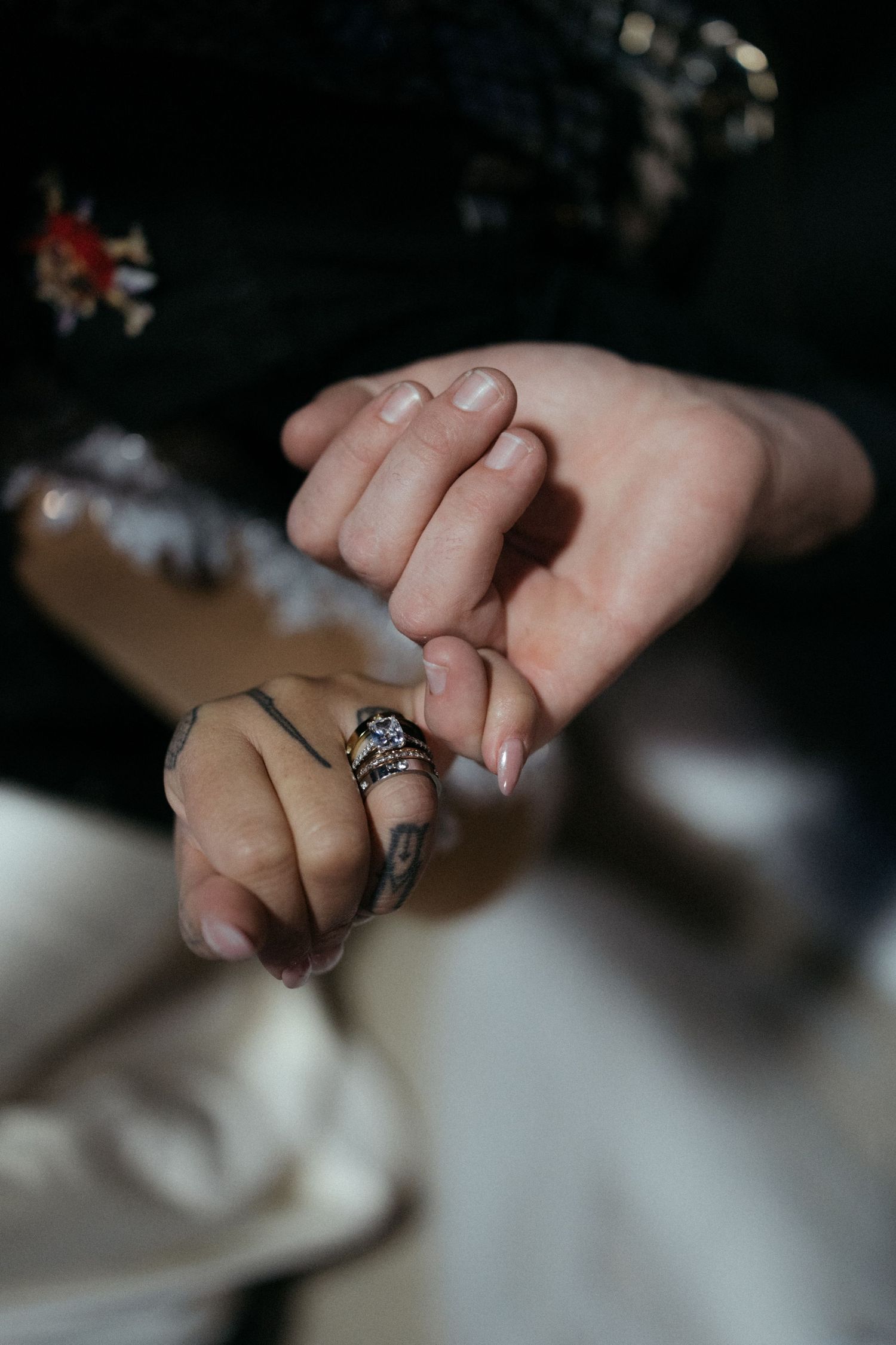 Close-up sequence of hands with rings showing intimate moments.