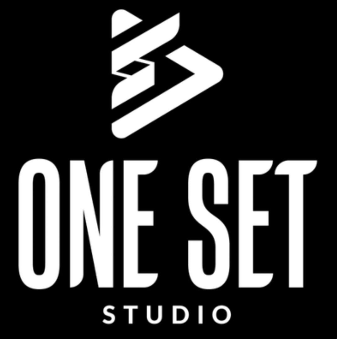 One Set Studio logo in white on black background, featuring a geometric arrow icon above bold text.