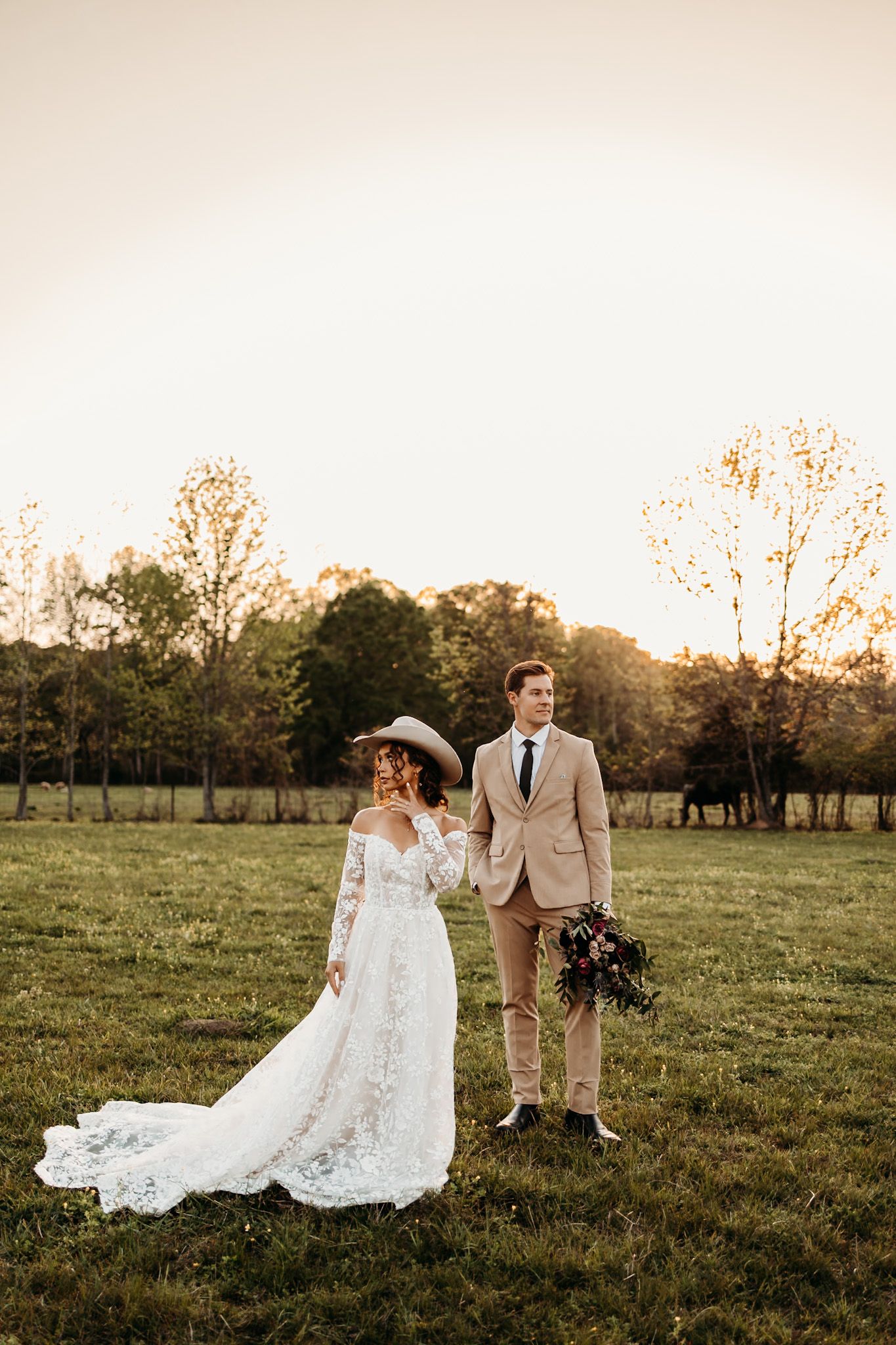 bride and groom at sunset