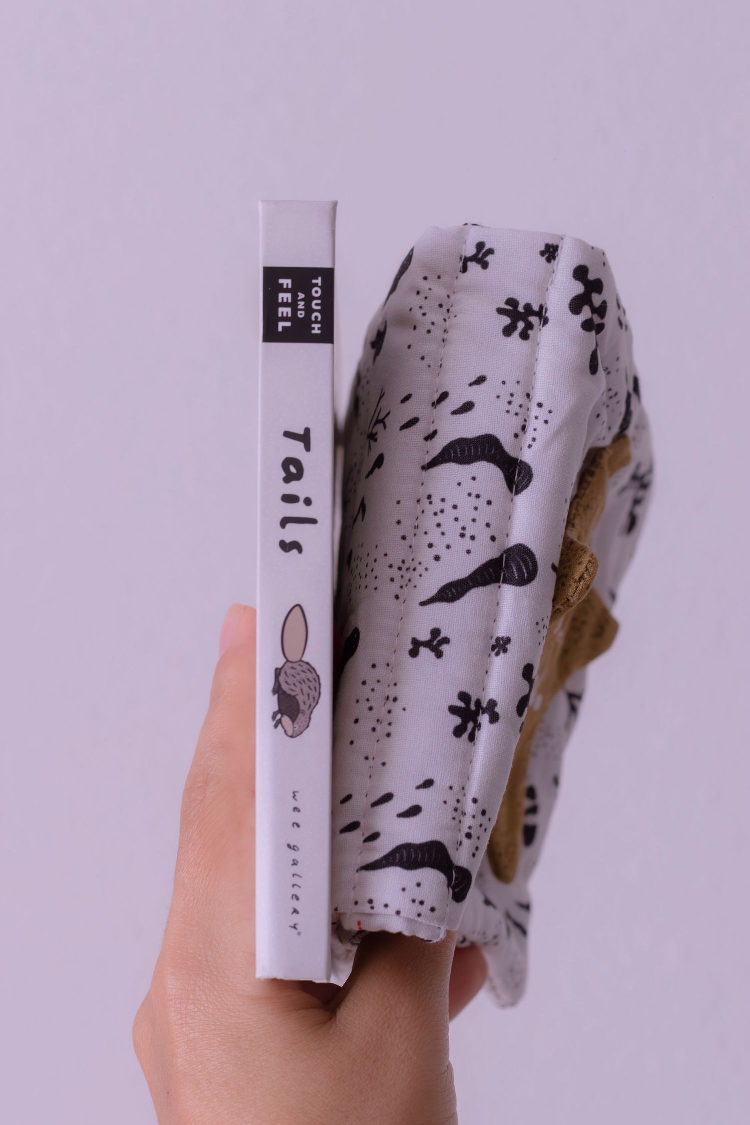 Hand holding the book 