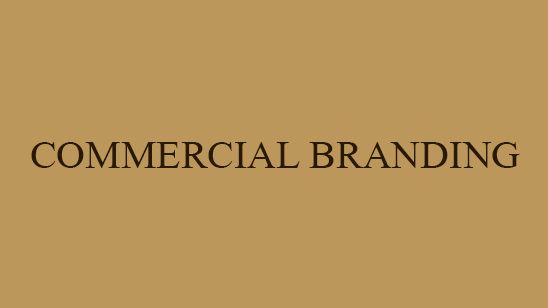 Gold background with elegant dark brown serif text reading Commercial Branding in a minimalist layout.