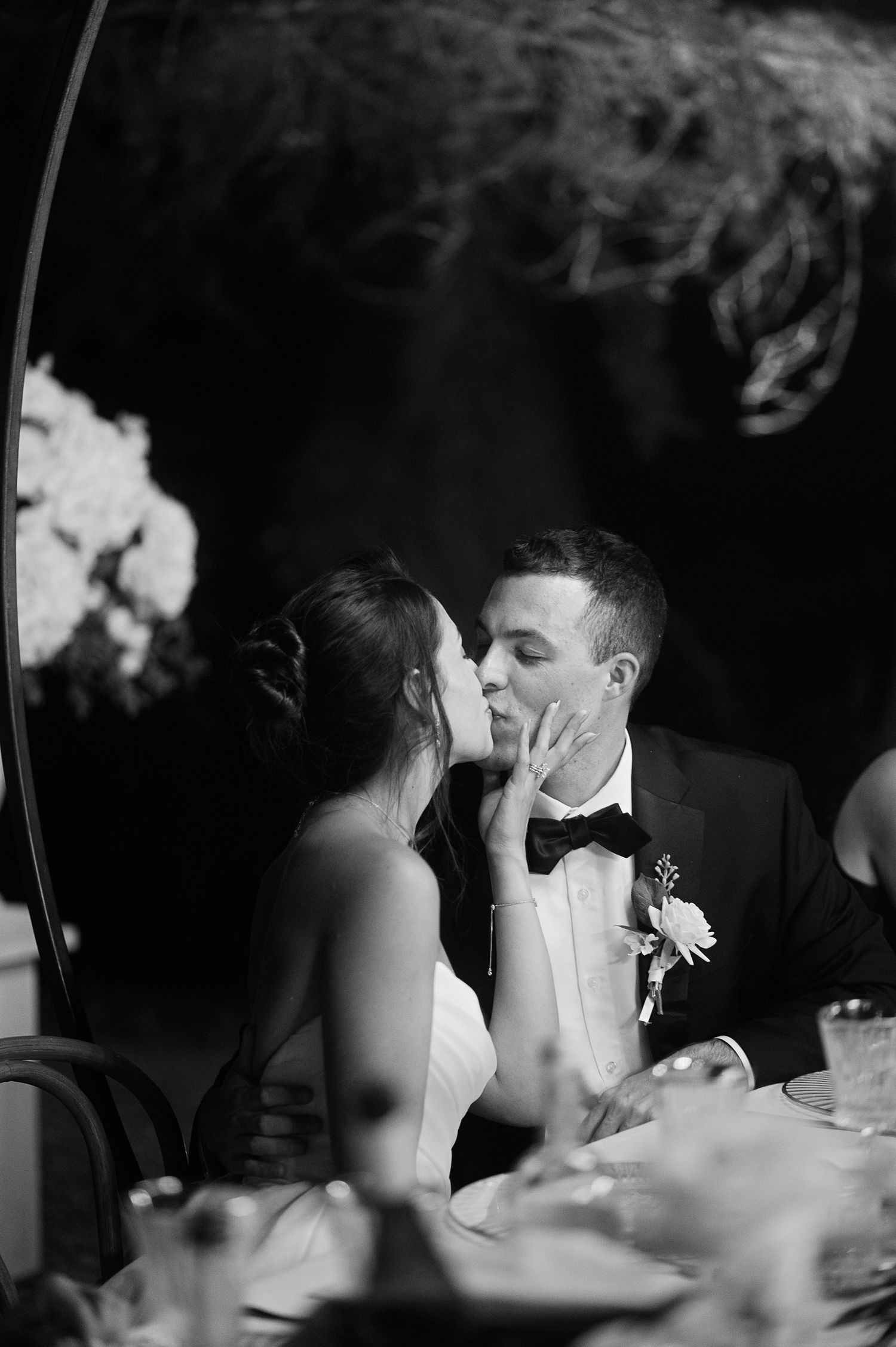 Intimate black and white wedding moment captured during a luxury celebration in Tuscany, Italy
