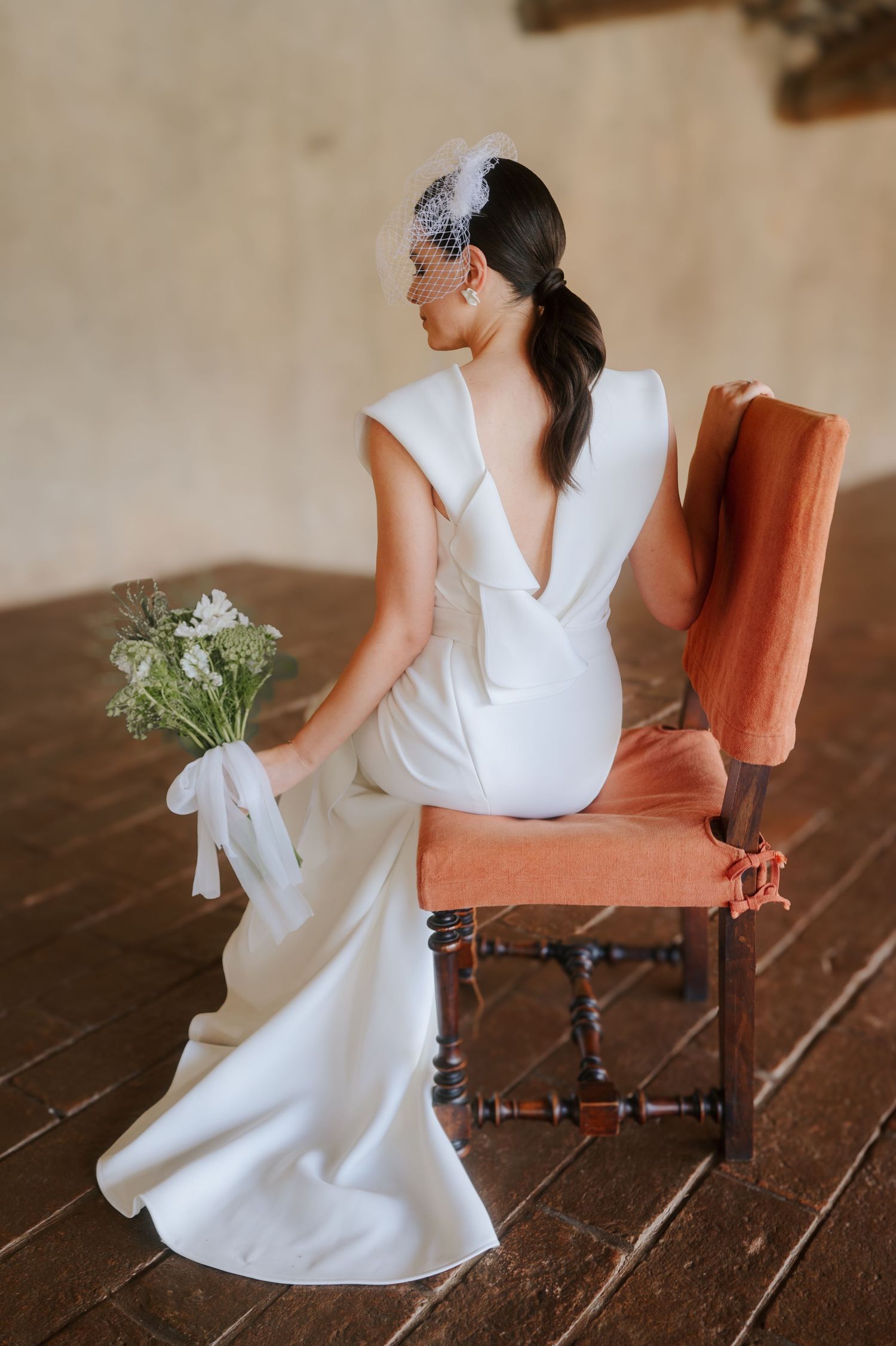 Elegant bridal portrait photographed indoors during a refined destination wedding in Tuscany
